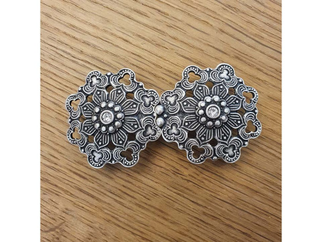 Schürzenschließe altsilber mit Steinchen in der Mitte 